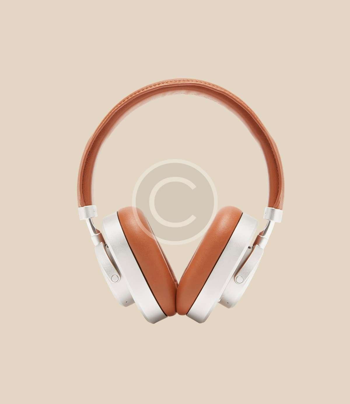 White and tan over-ear headphones